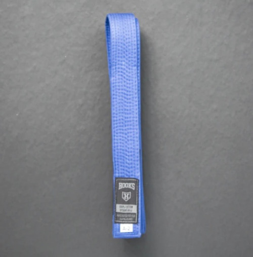 If you are looking to buy BJJ belts, visit Hooks Jiujitsu. We handcrafted belts especially for your BJJ journey. The fabric used in belts is highly comfortable. The elastic gives maximum flexibility to influence and fame the audience. The belt has five levels-white, blue, purple, brown, and black. The ranking and progression of the BJJ belts are awarded in different colors. The quality of the fabric is equally important to give the practitioner ease and comfort ability during grappling. The (IBJJF) follow a set of rule to award the belt. The belt system defines the learning stage. Every belt has a specific indicator that determines the athlete's mindset, skill level, and hard work. After that stripes are awarded for time, behavior, knowledge, tournament and performance, etc. It is awarded based on age, experience, and expertise. Get premium quality BJJ belt, GI, rashguard, and accessories for all your BJJ need at our store. Order now! Visit https://hooksbrand.com/collections/belts