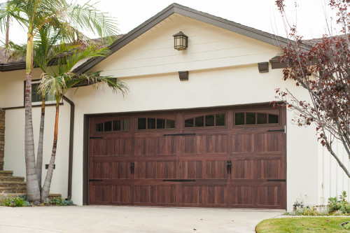 Carriage-accents-arched-madison-Steel-Door.jpg