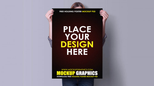 Man-Holding-Poster-Mockup-www.mockupgraphics.com-1.jpg