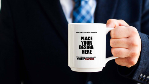 hand-holding-mug-mockup-www.mockupgraphics.com-1.jpg