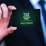 handing-holding-business-card-www.mockupgraphics.com-2